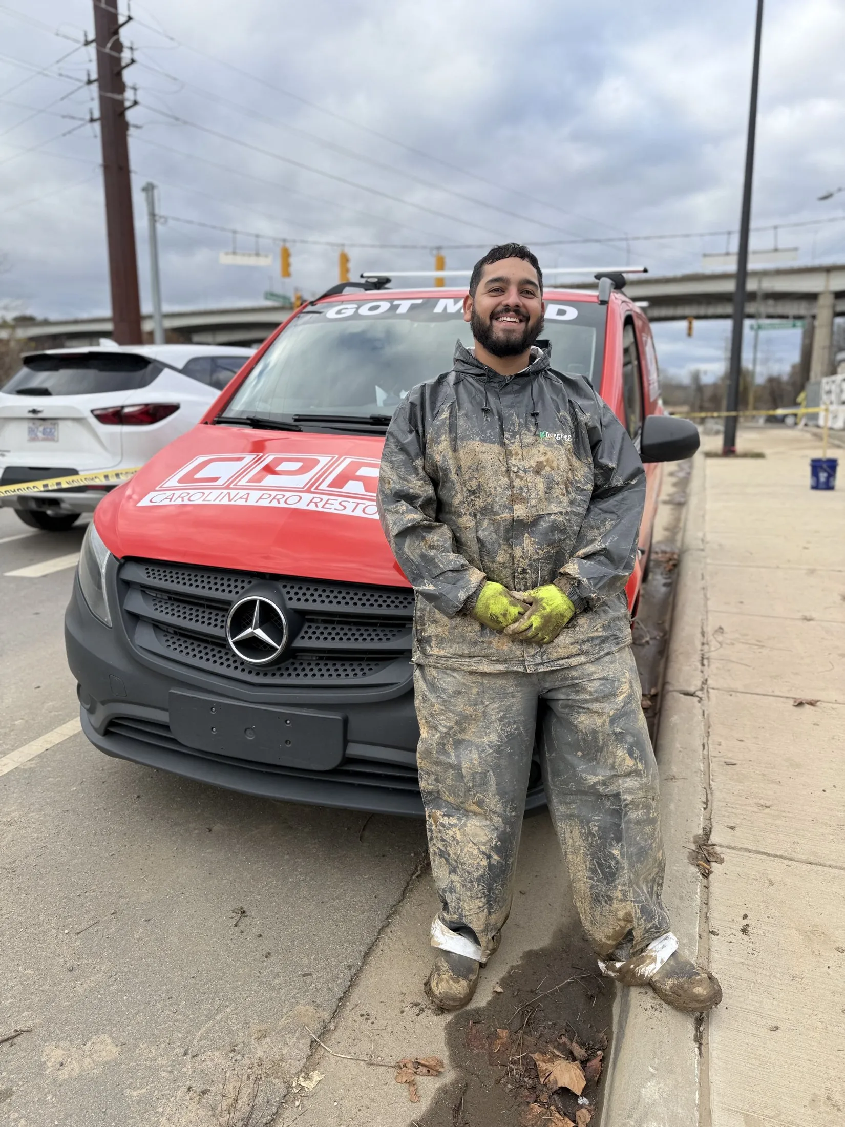 Carolina Pro Restoration technician beside a company van in Fort Mill, SC