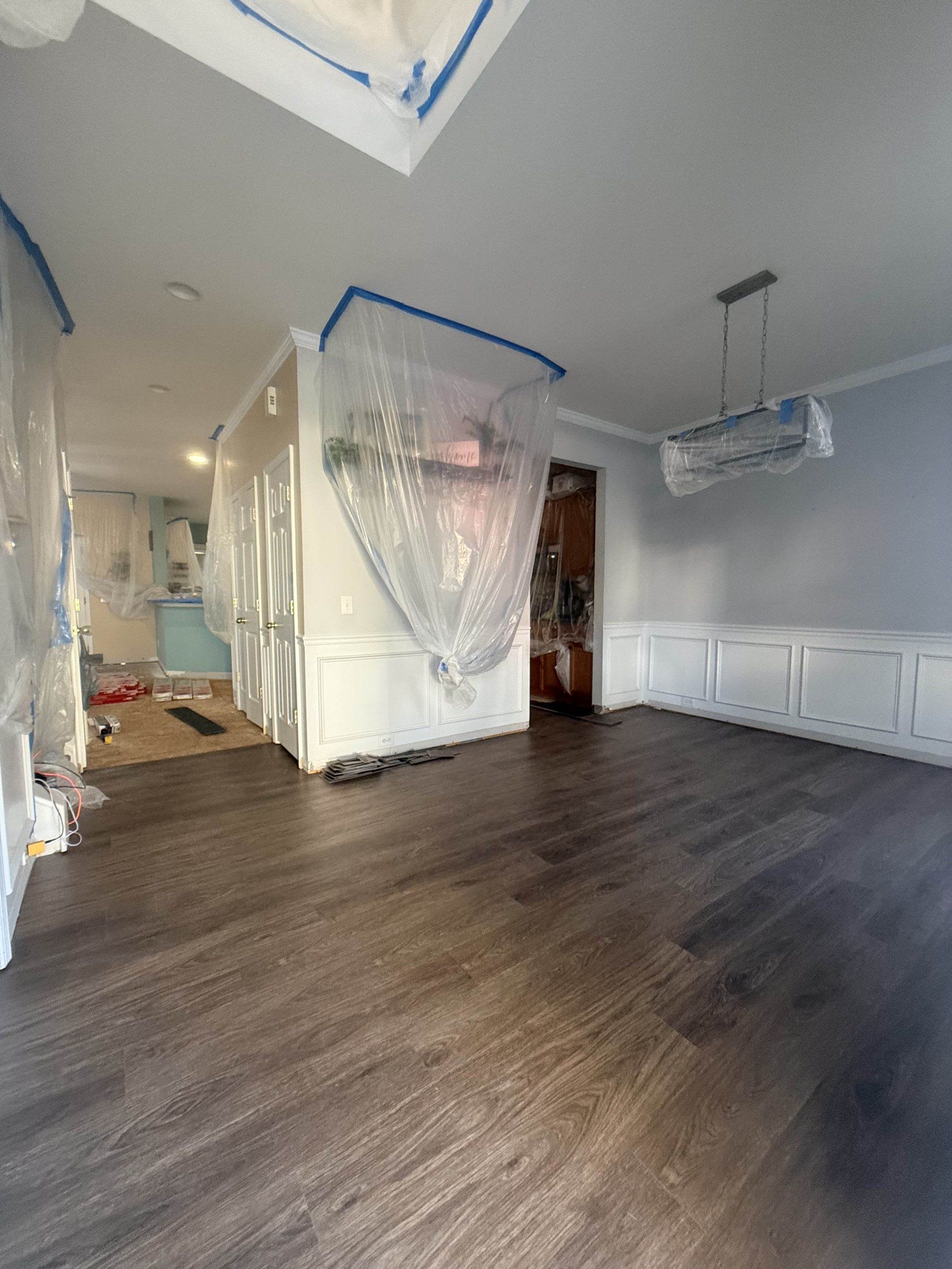 The same home with new luxury vinyl plank flooring installed